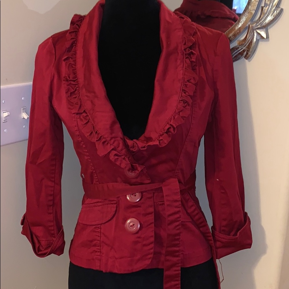 Gently used red blazer with ruffle detail